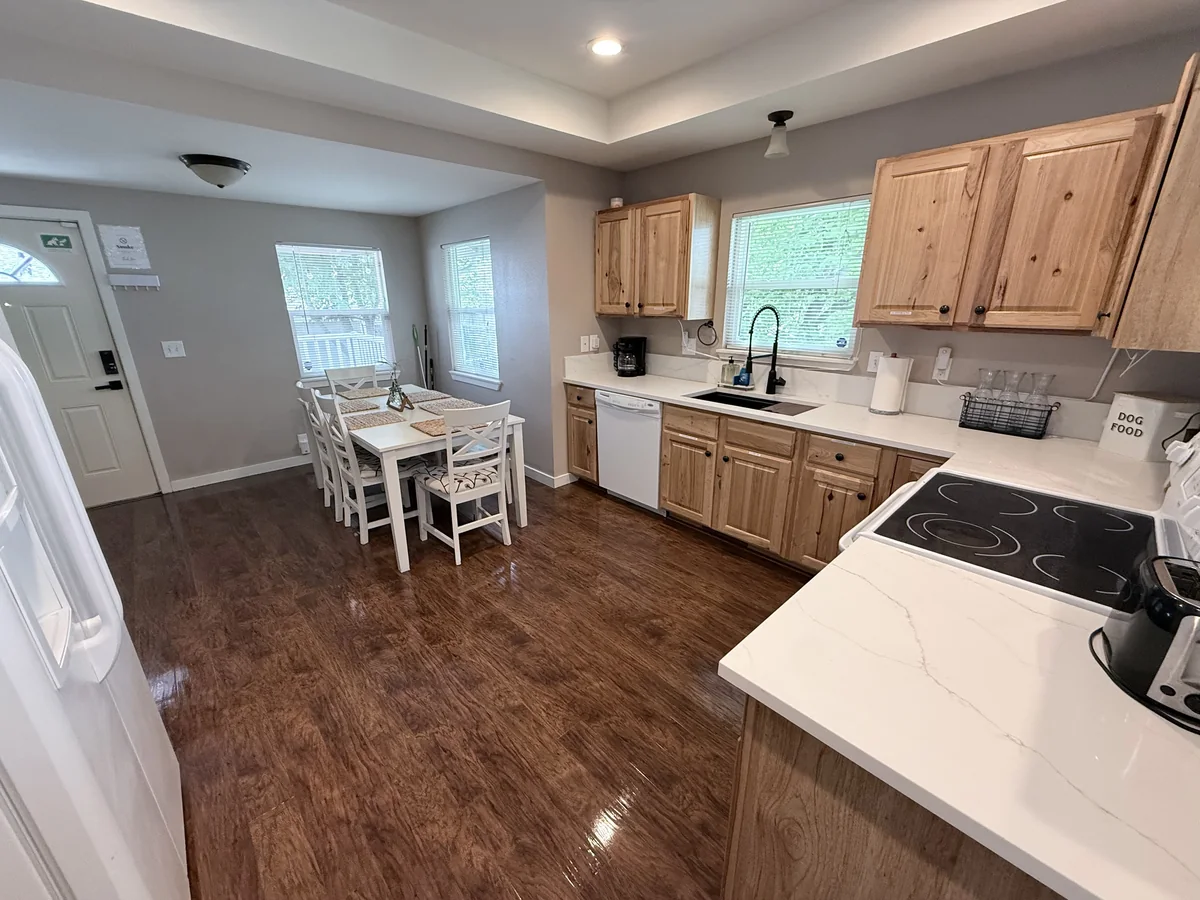 Kitchen counters, floors, and appliance fronts cleaned